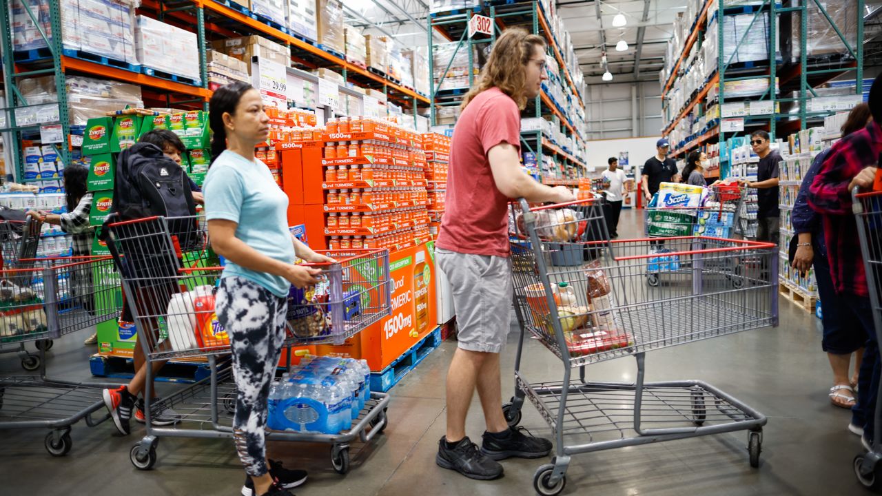 Customers wait in line to check out purchases at Costco store on June 28, 2023 in Teterboro, New Jersey. 