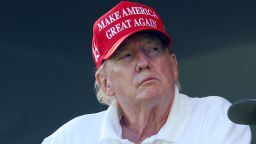 BEDMINSTER, NEW JERSEY - AUGUST 13: Former President Donald Trump and aide Walt Nauta (L) look on at the 18th green during day three of the LIV Golf Invitational - Bedminster at Trump National Golf Club on August 13, 2023 in Bedminster, New Jersey. (Photo by Mike Stobe/Getty Images)