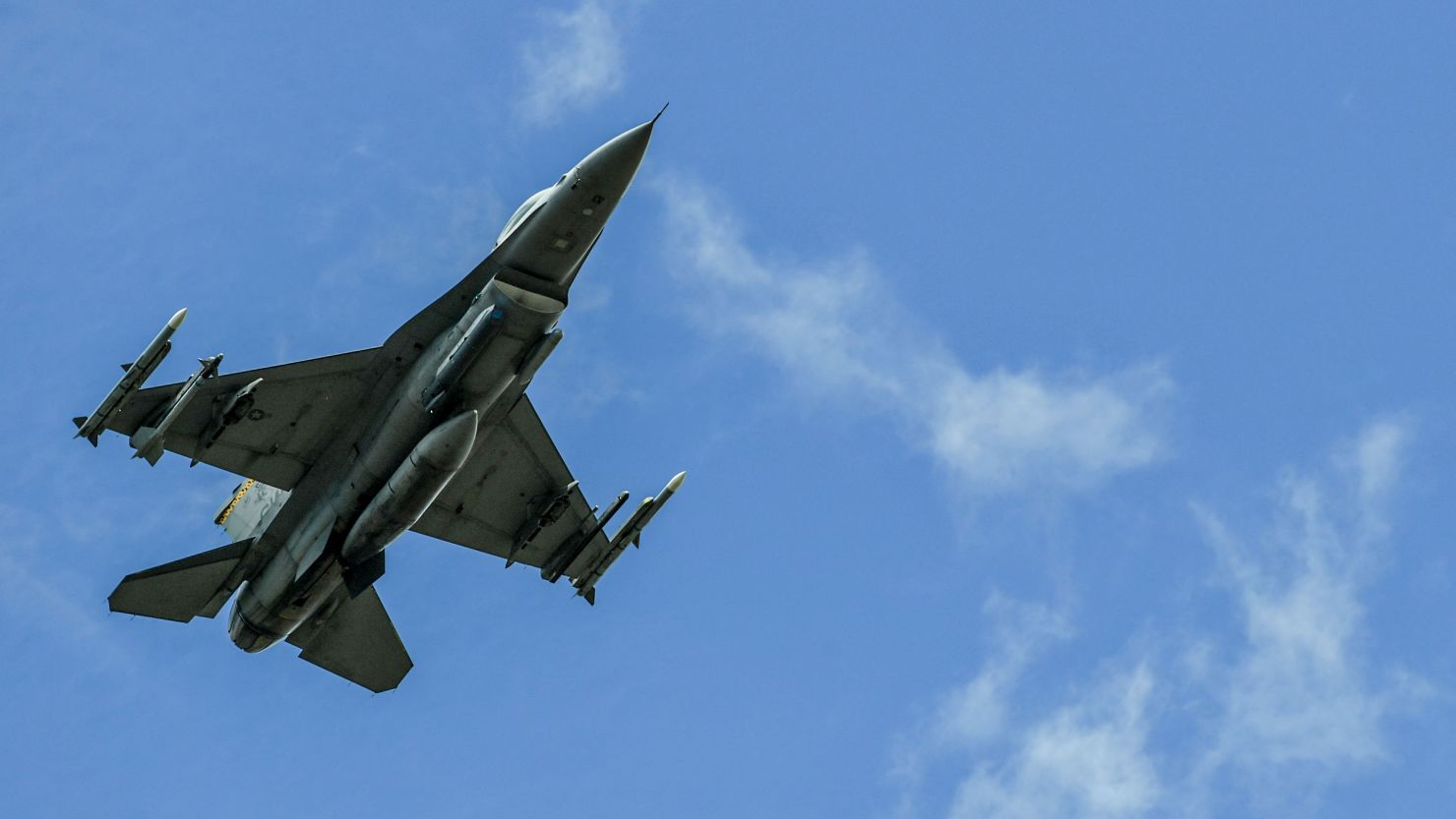 A US Air Force F-16 aircraft flies near the Rionegro Airport during military drills between the Colombia and the United States Air Forces in Rionegro, Antioquia department, Colombia on July 12, 2021. (Photo by JOAQUIN SARMIENTO / AFP) (Photo by JOAQUIN SARMIENTO/AFP via Getty Images)