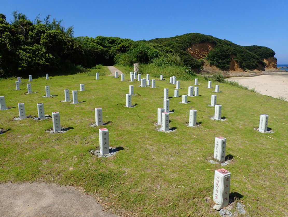 Photograph of the Hirota site today in Tanegashima, Japan. Each marker indicates where burials were found along with the notes on their sex and approximate age group.