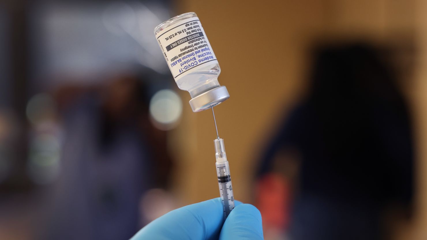 CHICAGO, ILLINOIS - SEPTEMBER 09: A pharmacist prepares to administer  COVID-19 vaccine booster shots during an event hosted by the Chicago Department of Public Health at the Southwest Senior Center on September 09, 2022 in Chicago, Illinois. The recently authorized booster vaccine protects against the original SARS-CoV-2 virus and the more recent omicron variants, BA.4 and BA.5.  (Photo by Scott Olson/Getty Images)