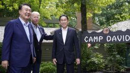 South Korea's President Yoon Suk Yeol, left, President Joe Biden and Japan's Prime Minister Fumio Kishida, right, meet Friday, Aug. 18, 2023, at Camp David, the presidential retreat, near Thurmont, Md. (AP Photo/Andrew Harnik)