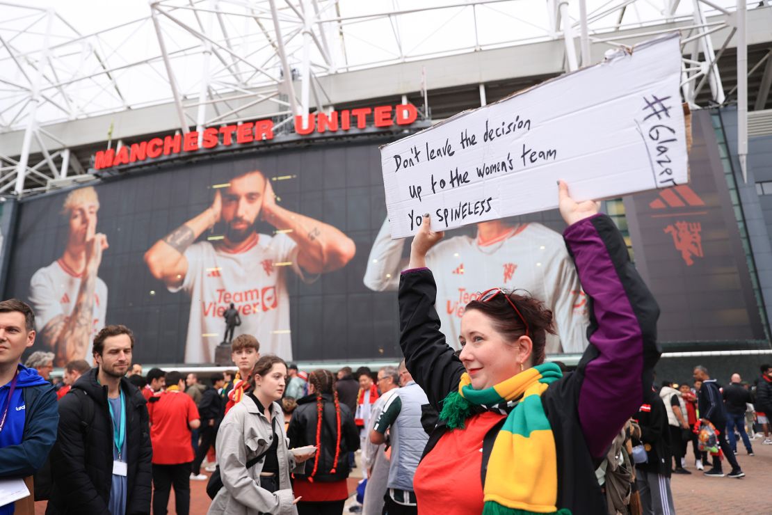 MANCHESTER, ENGLAND - AUGUST 14: Manchester United fans protest against the Glazers with a sign referencing articles that have recently come out about the Mason Greenwood situation during the Premier League match between Manchester United and Wolverhampton Wanderers at Old Trafford on August 14, 2023 in Manchester, England. (Photo by Simon Stacpoole/Offside/Offside via Getty Images)