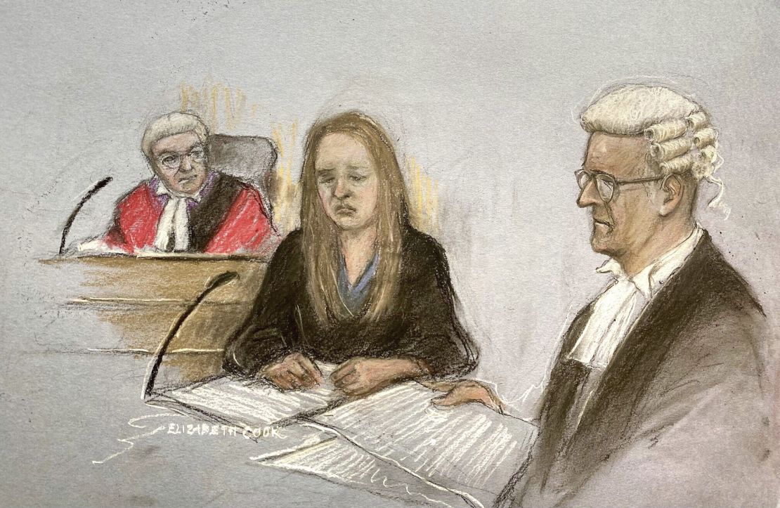 Lucy Letby (center) is shown hearing evidence in a courtroom sketch on Friday. 