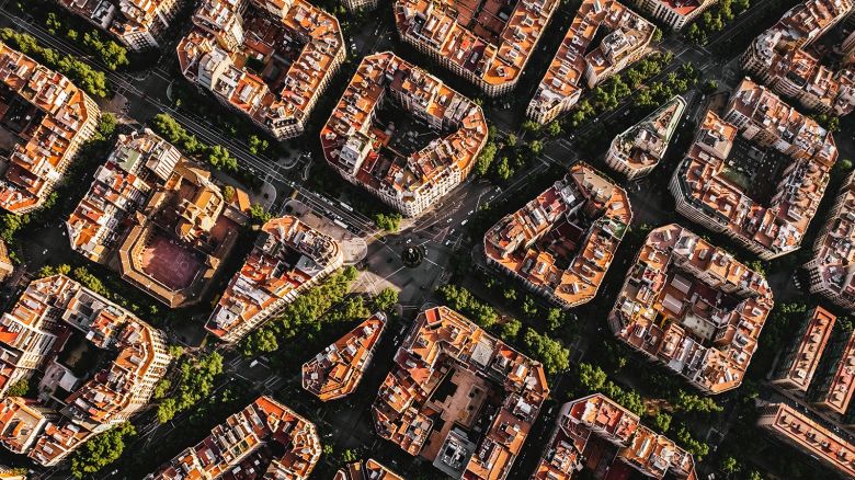 Aerial view of typical buildings of Barcelona cityscape from helicopter.