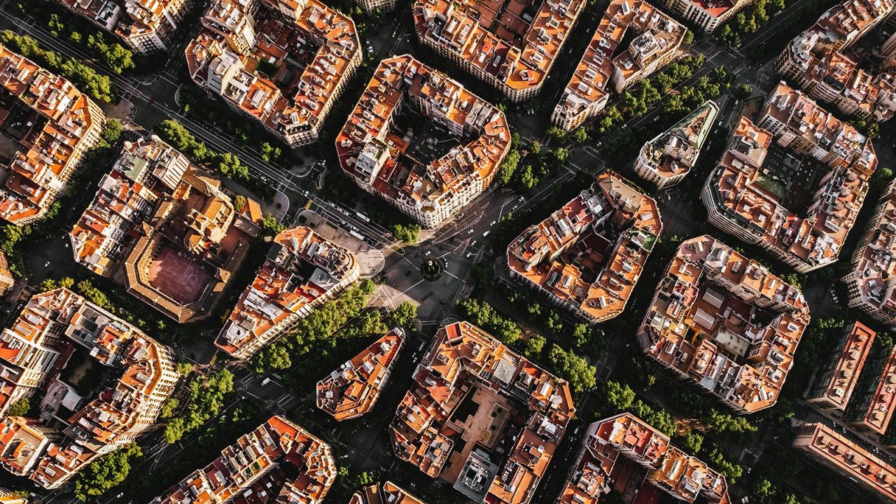 Aerial view of typical buildings of Barcelona cityscape from helicopter.