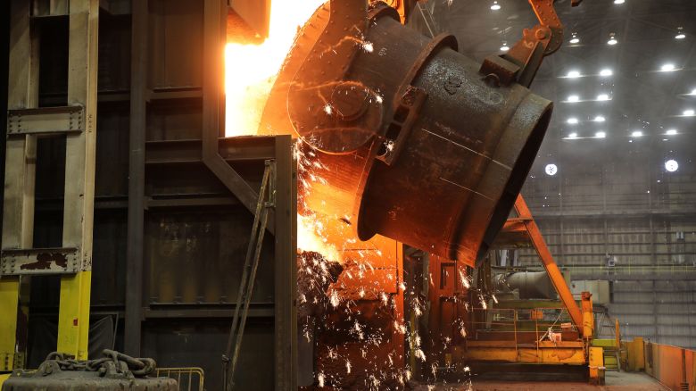 A ladle of molten iron is poured into a Basic Oxygen Process (BOP) furnace at U. S. Steel's Granite City Works, where it will be transformed into liquid steel.