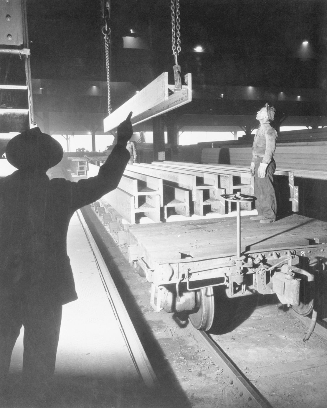 The first steel beams for the United Nations  Building are loaded at the Homestead Works of US Steel's Carnegie-Illinois Steel Corp.