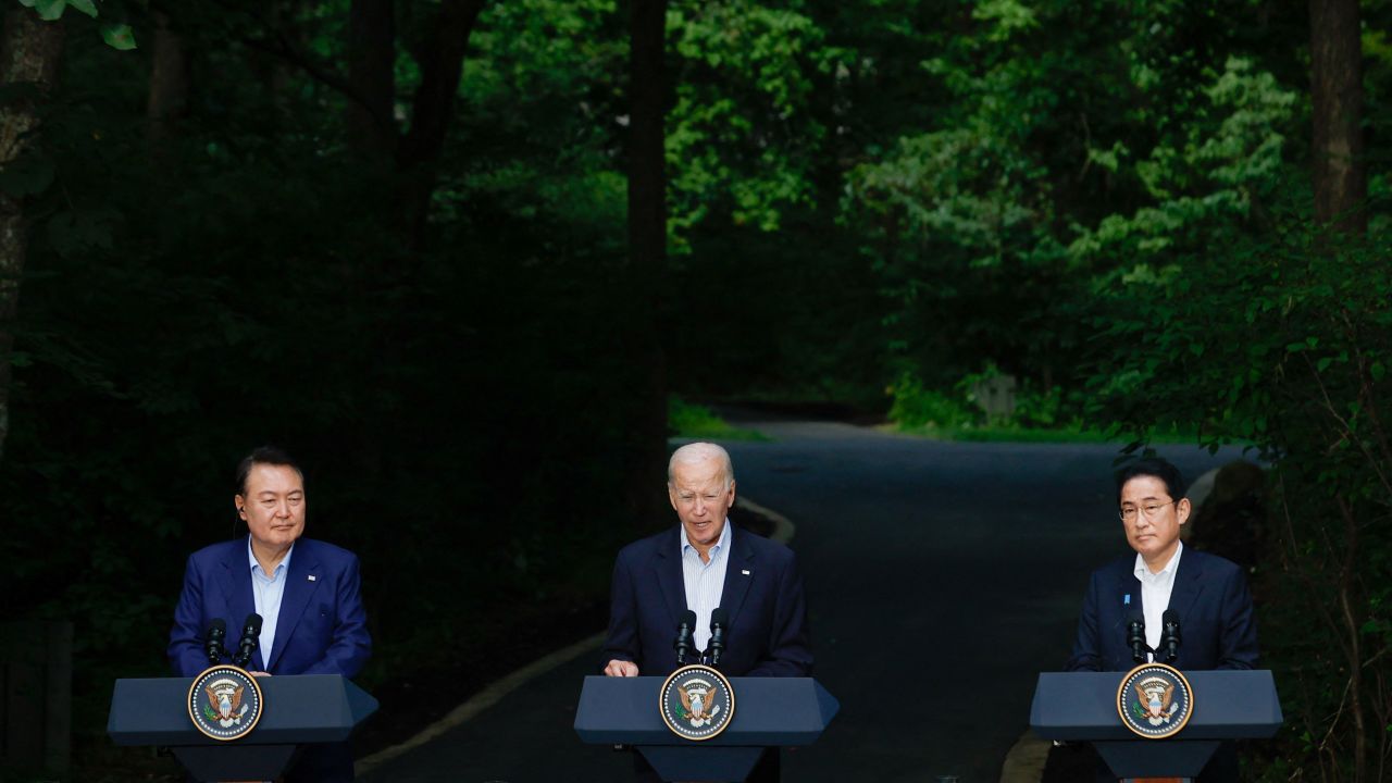 South Korean President Yoon Suk Yeol, US President Joe Biden and Japanese Prime Minister Fumio Kishida attend a joint press conference during the trilateral summit at Camp David on August 18.