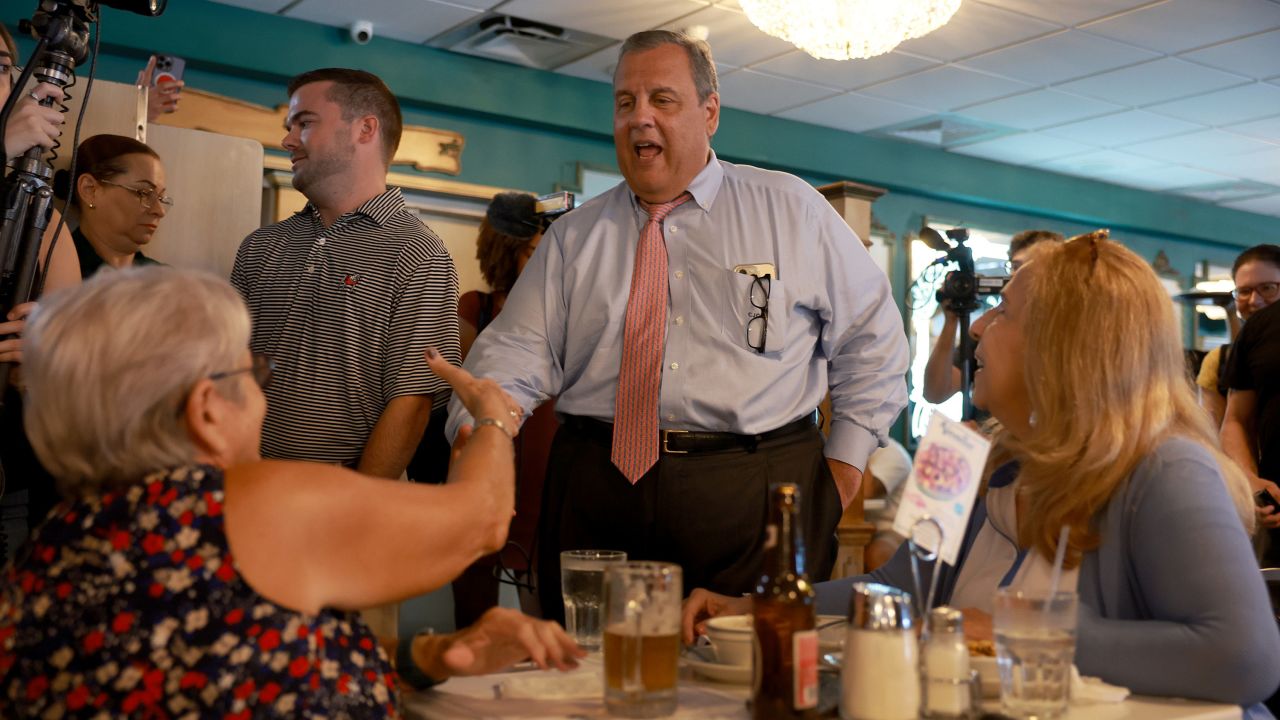 MIAMI, FLORIDA - AUGUST 18: Former New Jersey Gov. and Republican presidential candidate Chris Christie greets people during a campaign stop at the Versailles Restaurant on August 18, 2023 in Miami, Florida. Christie is seeking the 2024 Republican Presidential nomination to run against President Joe Biden. (Photo by Joe Raedle/Getty Images)
