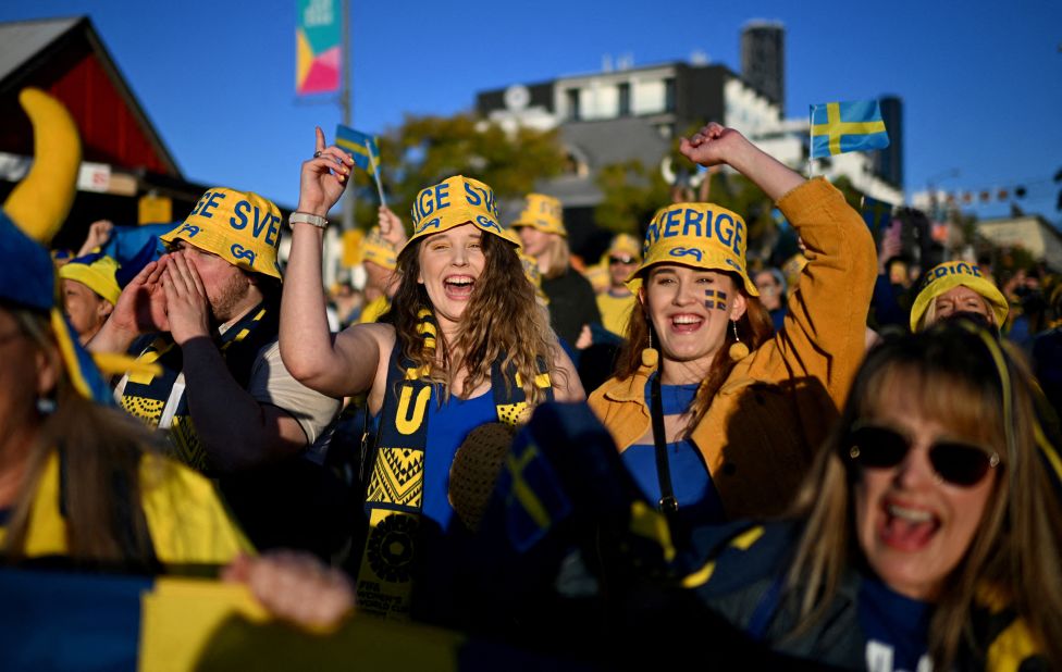 Sweden fans show support outside the stadium before the third-place playoff match.