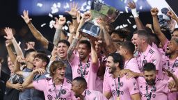 Lionel Messi of Inter Miami hoists the trophy with his teammates after defeating the Nashville SC to win the Leagues Cup 2023 final match at GEODIS Park in Nashville, Tennessee. 