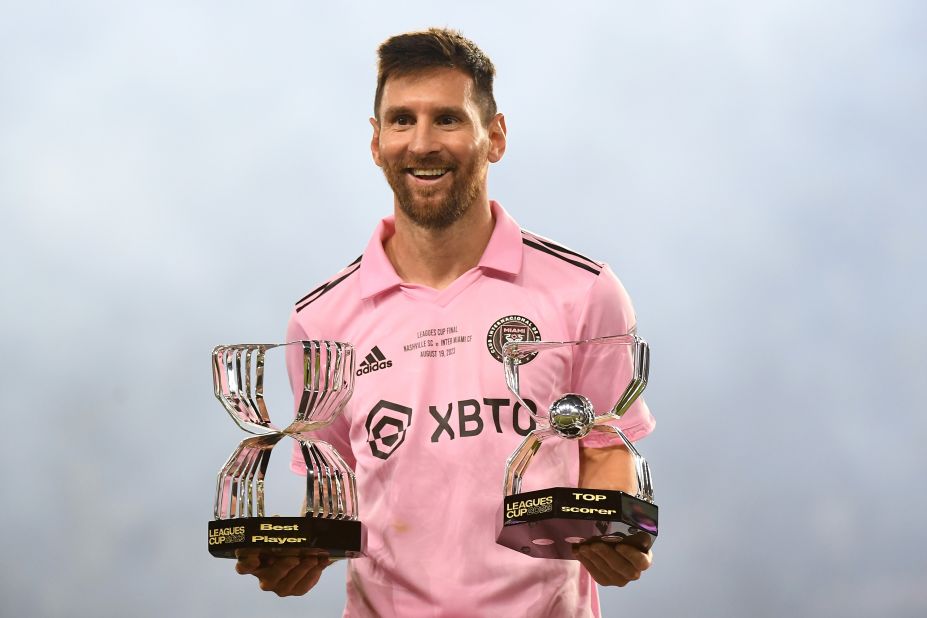 Messi holds the trophies for top scorer and best player after Inter Miami won the Leagues Cup tournament in August 2023. Messi scored 10 goals in seven matches.