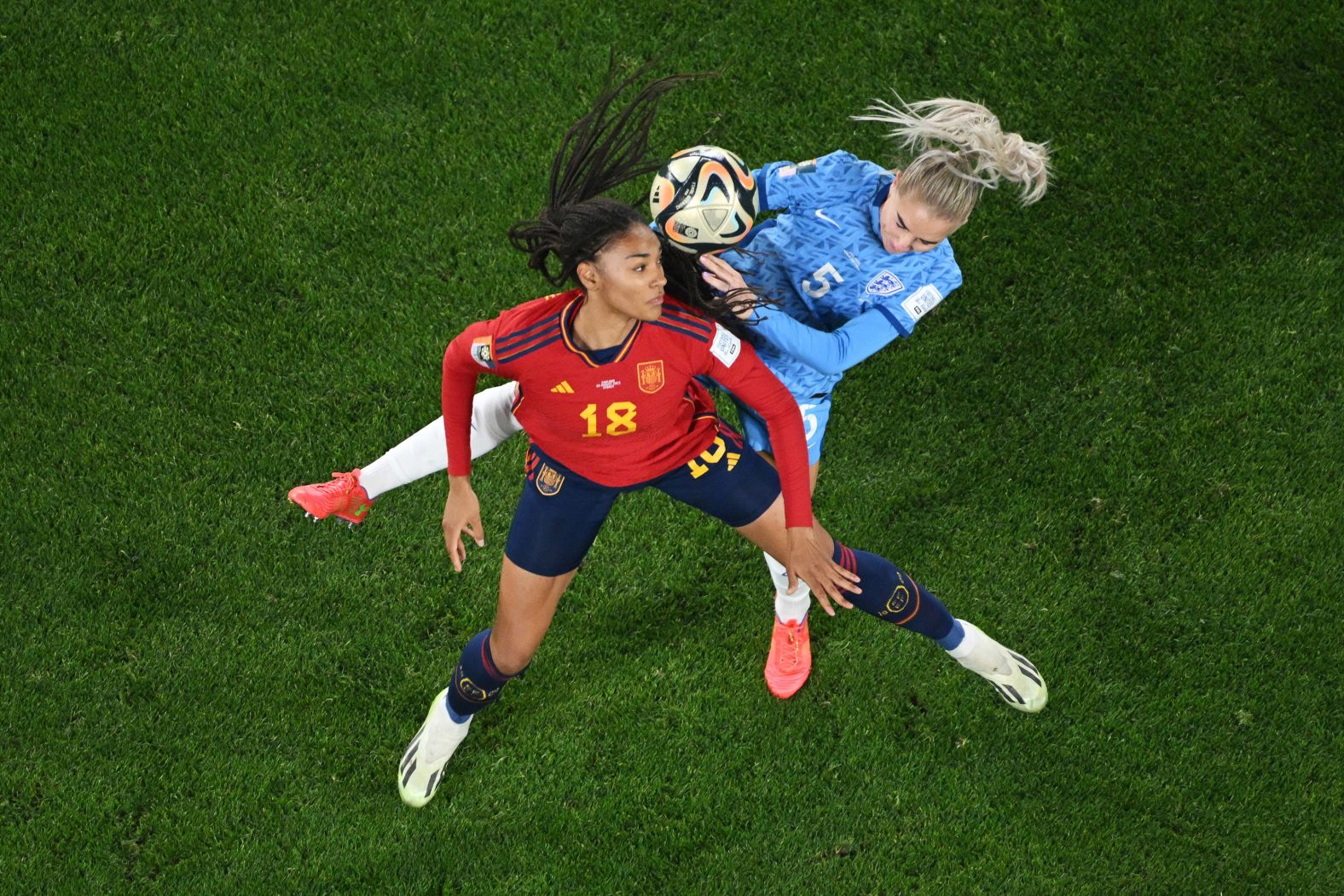 Paralluelo, left, competes for the ball with Greenwood.