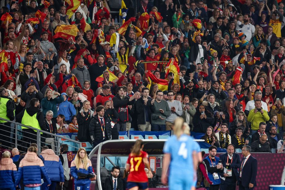 Spanish fans celebrate as the teams leave the field at halftime.