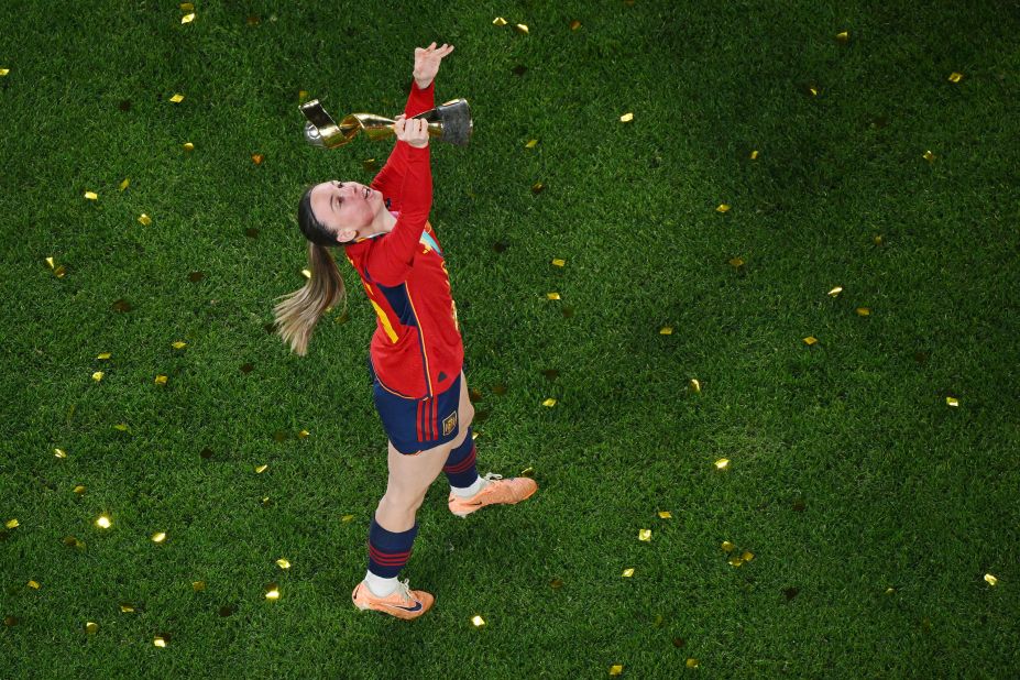 Spain's Eva Navarro celebrates with the Women's World Cup trophy.