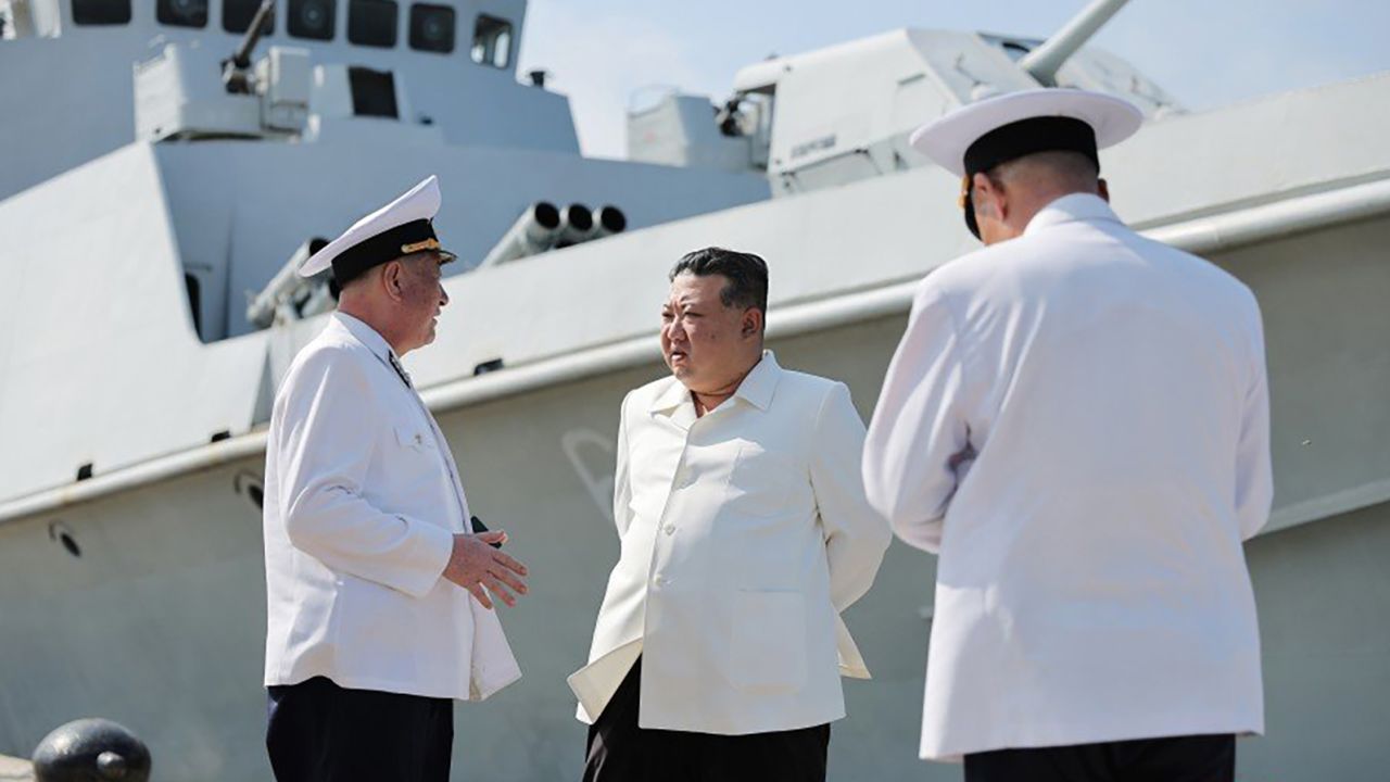 Kim Jong Un speaking to members of the North Korean Navy ahead of a missile test, in photos released by state media KCNA.