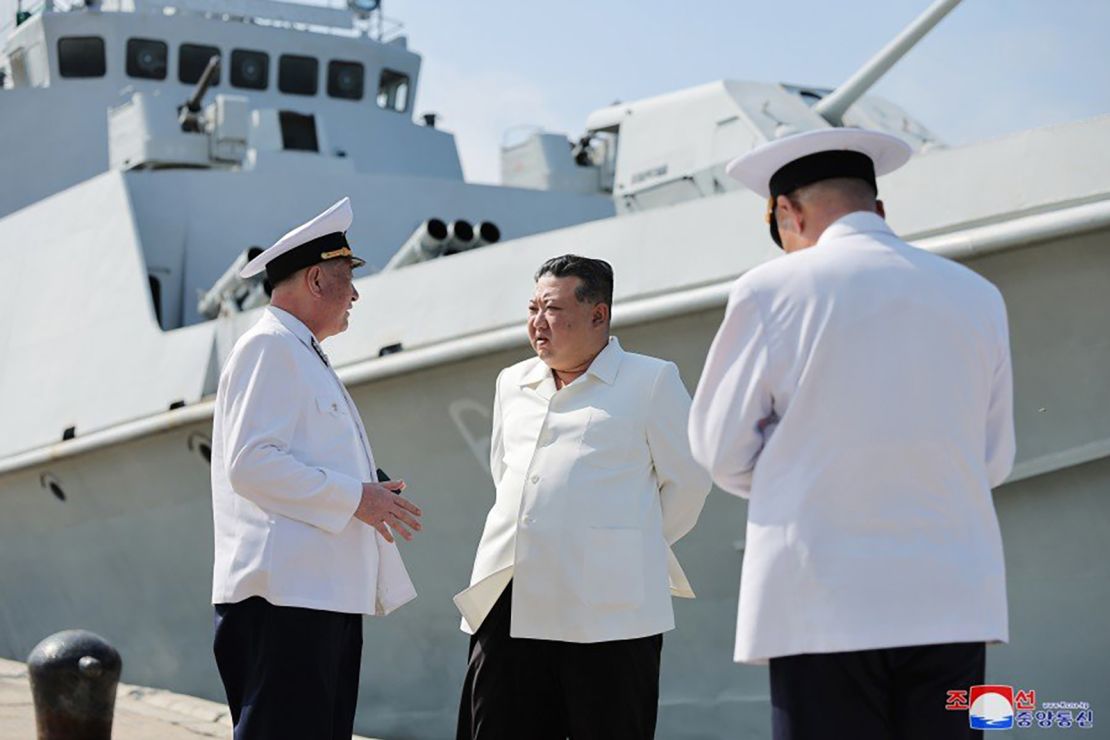 Kim Jong Un speaking to members of the North Korean Navy ahead of a missile test, in photos released by state media KCNA.