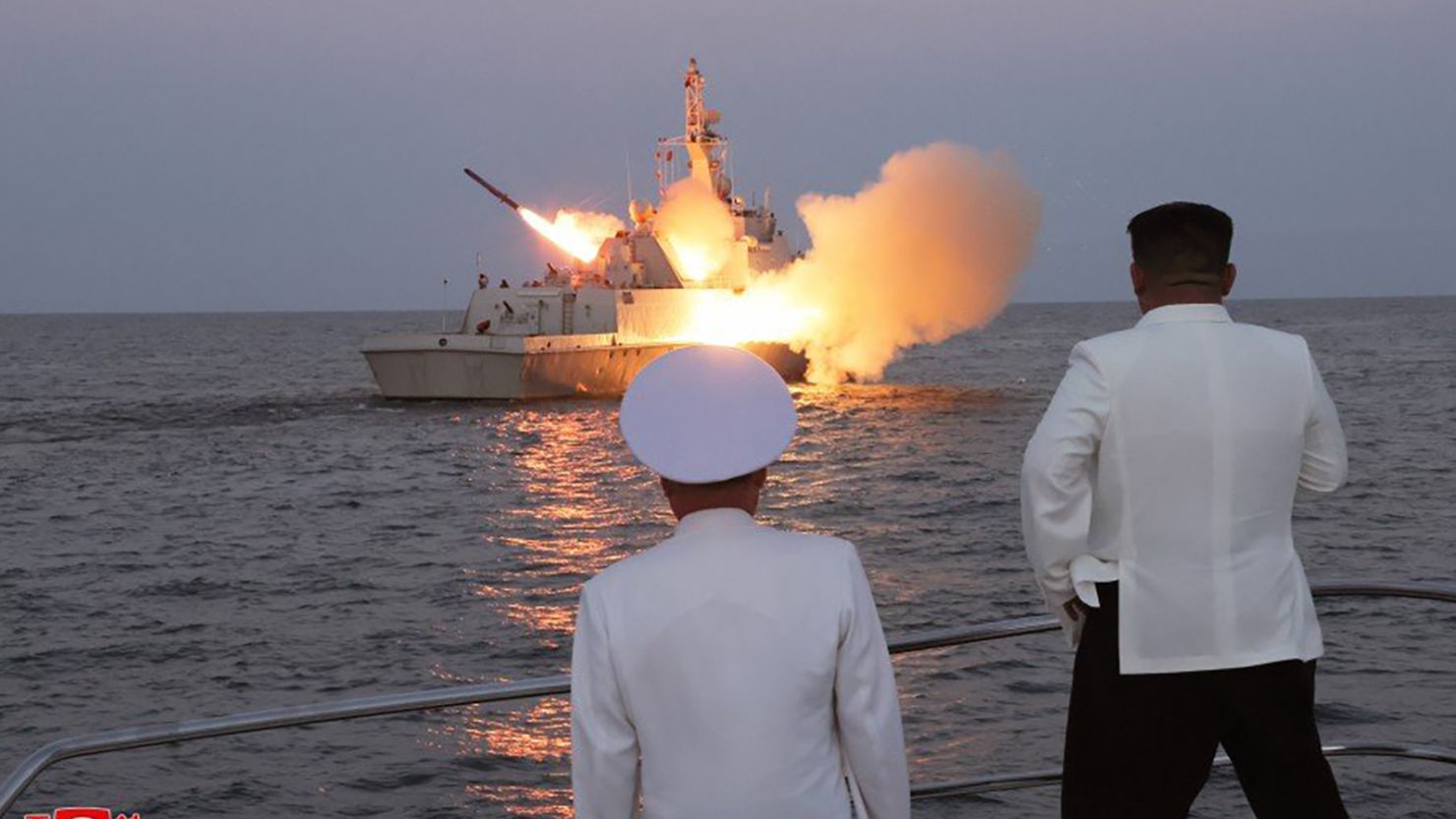 North Korean leader Kim Jong Un watches the test of a cruise missile from a patrol ship.