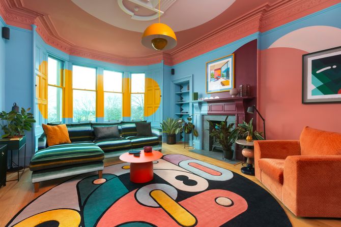 Playful colors and shapes in a home designed by Studio Sam Buckley in Edinburgh, UK. Scroll through the gallery to see more images from the book "Living to the Max: Opulent Homes & Maximalist Interiors."