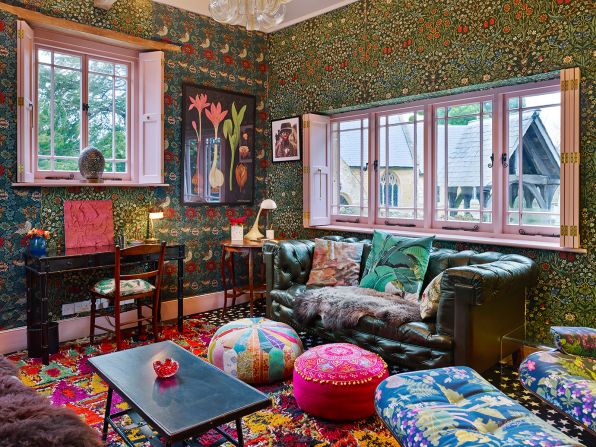 Solange Azagury-Partridge's home is rich in furnishings, patterned wallpaper and floral motifs.