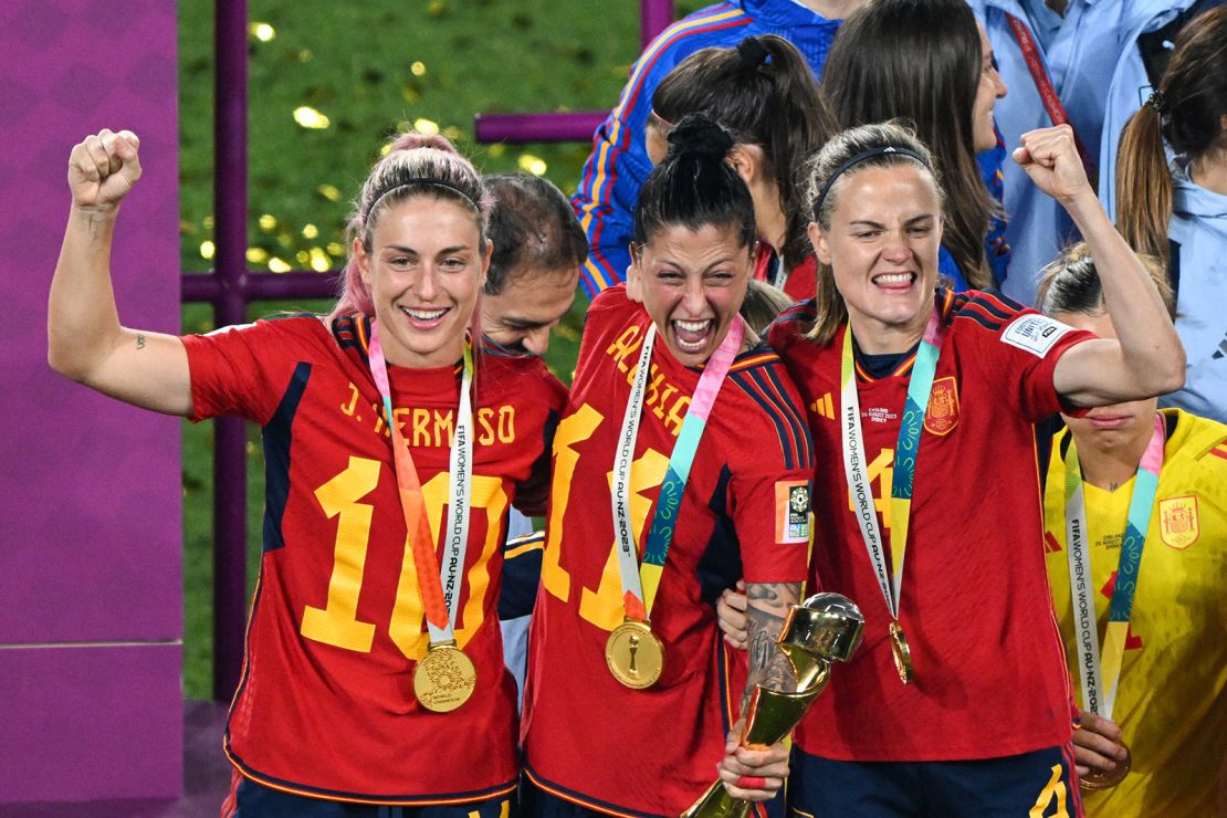 Spain's players celebrate with the trophy after winning the Australia and New Zealand 2023 Women's World Cup final football match between Spain and England at Stadium Australia in Sydney on August 20, 2023.