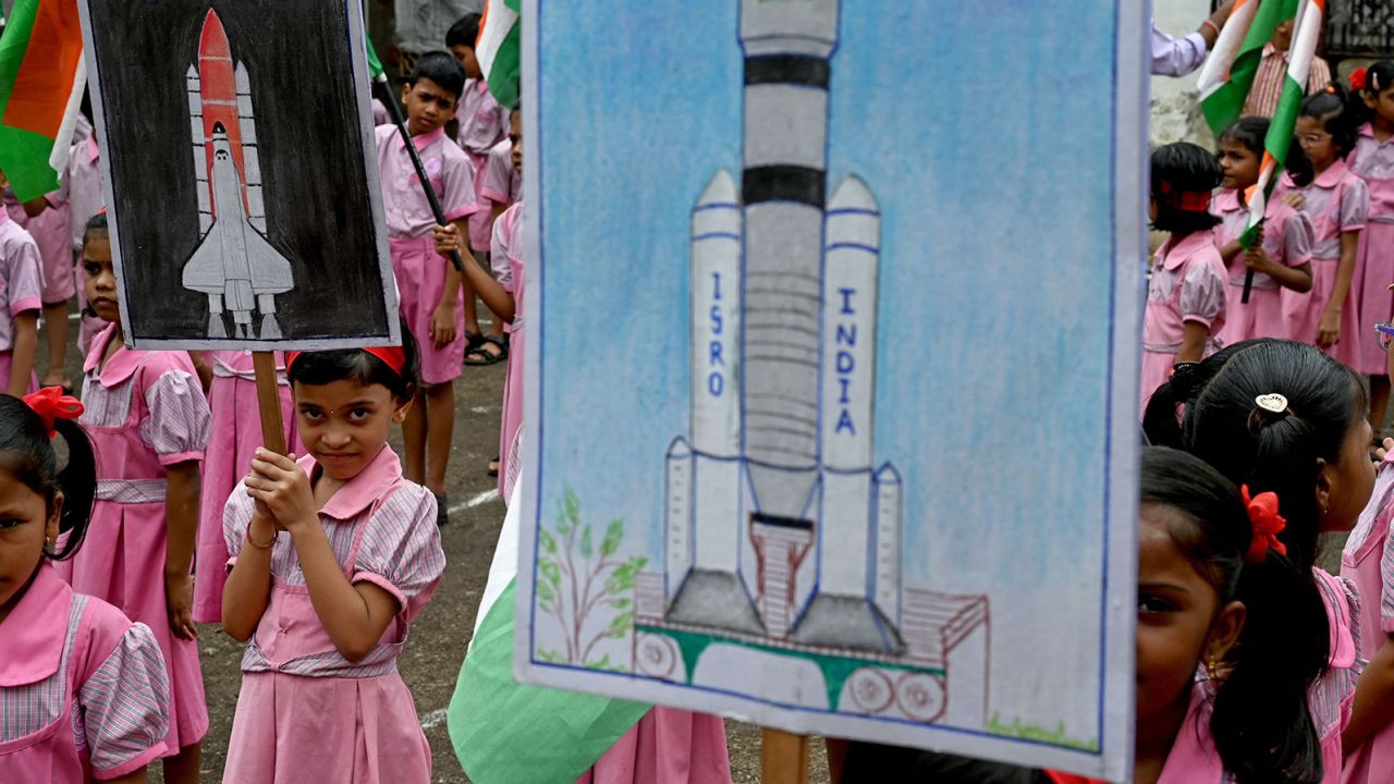 Students gather with posters to support the Chandrayaan-3 spacecraft in Mumbai on August 22, 2023. The Indian Space Research Organization (ISRO) has confirmed that the Chandrayaan 3 landing module has been confirmed. 