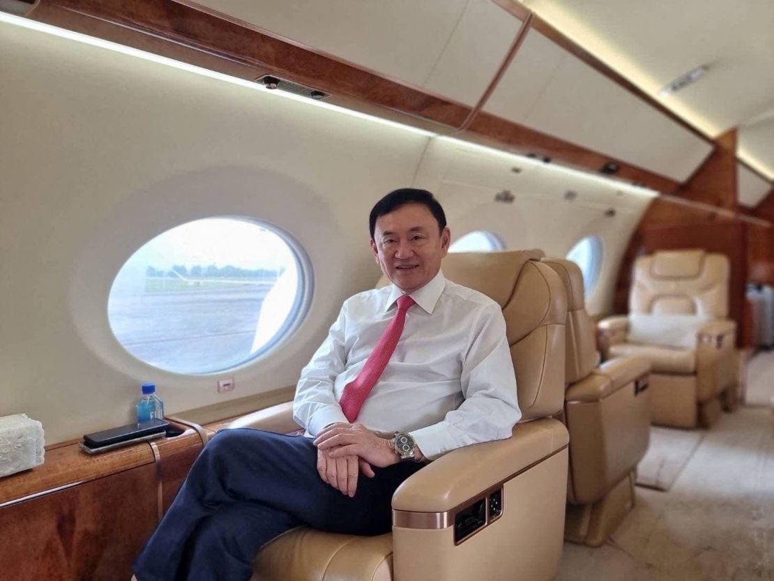 Thaksin Shinawatra pictured inside a plane at an unknown location in this still image released on August 22. 