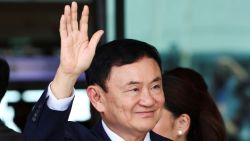 Former Thai Prime Minister Thaksin Shinawatra, who is expected to be arrested upon his return as he ends almost two decades of self-imposed exile, waves at Don Mueang airport in Bangkok, Thailand August 22, 2023.