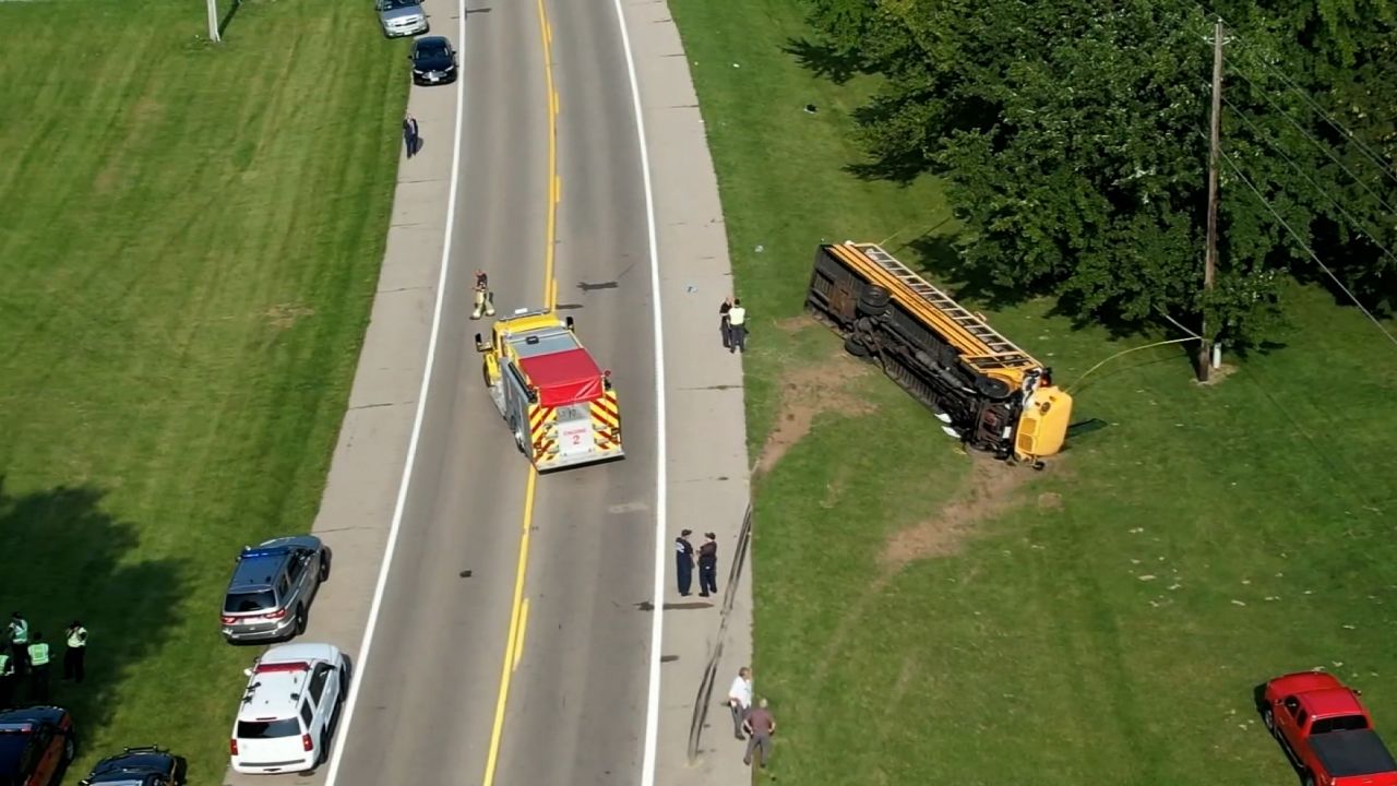 A student was killed when a Honda Odyssey struck a school bus after crossing the center line. The bus went off the road and overturned, according to the preliminary investigation.