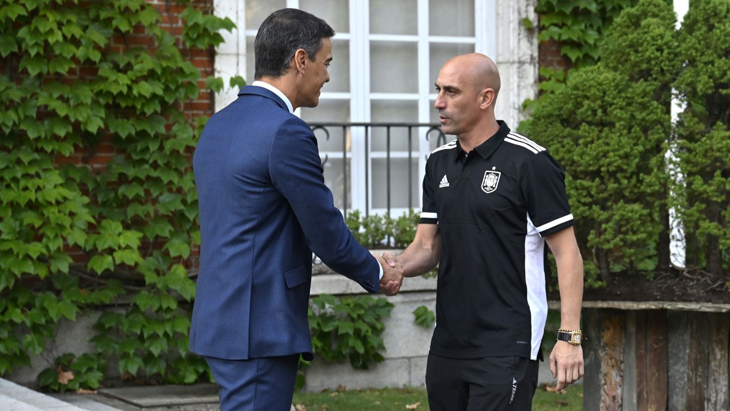 Spanish Prime Minister Pedro Sánchez (L) welcomes Royal Spanish Football Federation President Luis Rubiales at the Moncloa Presidential Palace in Madrid on August 22.