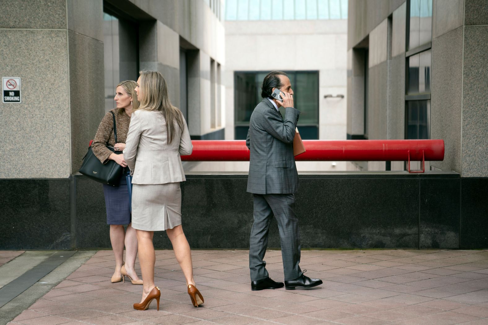 From left, Trump attorneys Marissa Goldberg, Jennifer Little and Drew Findling are seen in the Fulton County Courthouse in Atlanta on Monday, August 21. The lawyers met with the district attorney's office before <a href="index.php?page=&url=https%3A%2F%2Fwww.cnn.com%2F2023%2F08%2F21%2Fpolitics%2Ffulton-county-da-office-negotiations-trump%2Findex.html" target="_blank">the details of Trump's bond agreement</a> were released.