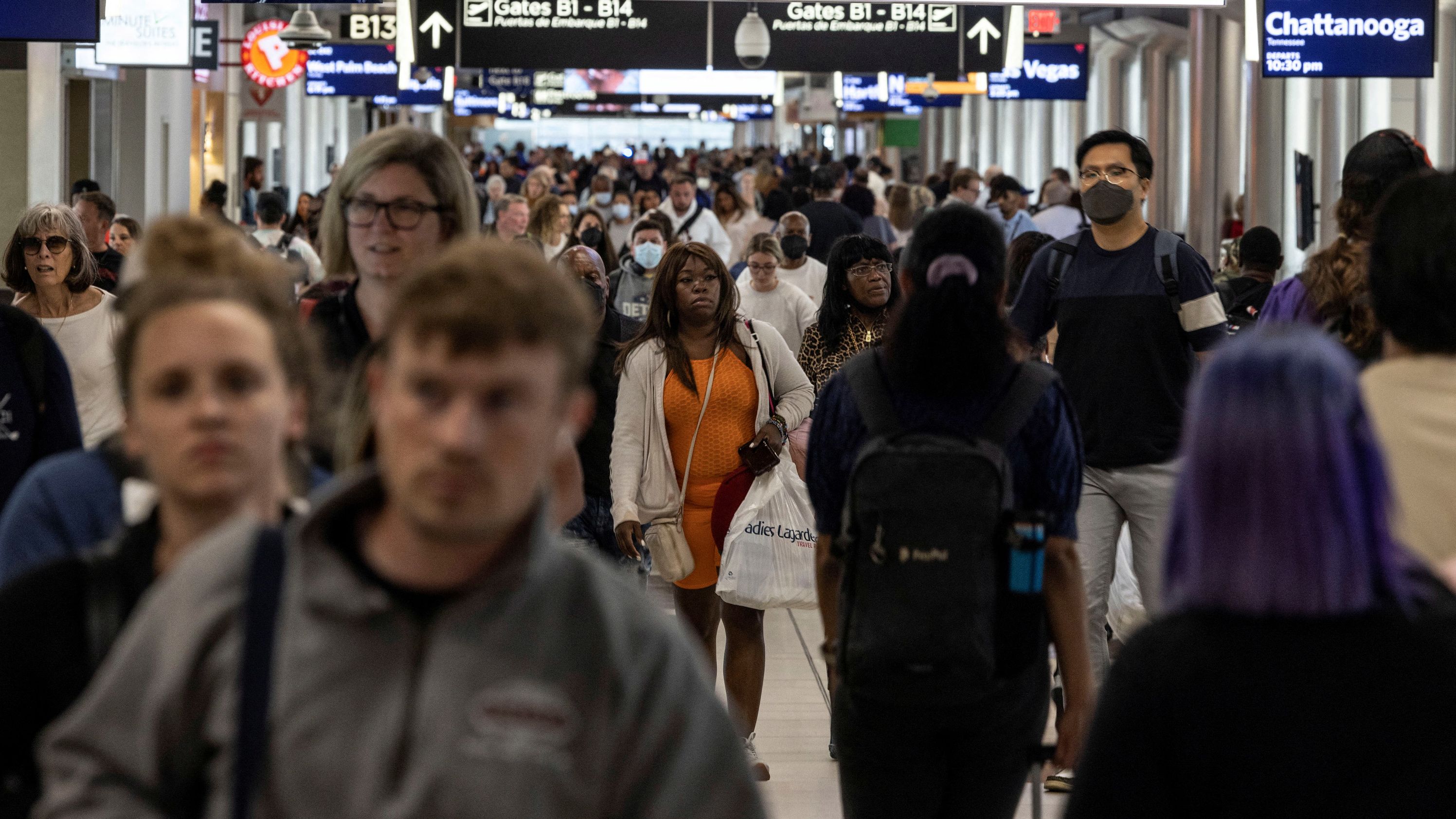 Passengers walk along terminal B of Hartsfield-Jackson Atlanta International Airport in Atlanta, Georgia, U.S., September 3, 2022. REUTERS/Carlos Barria