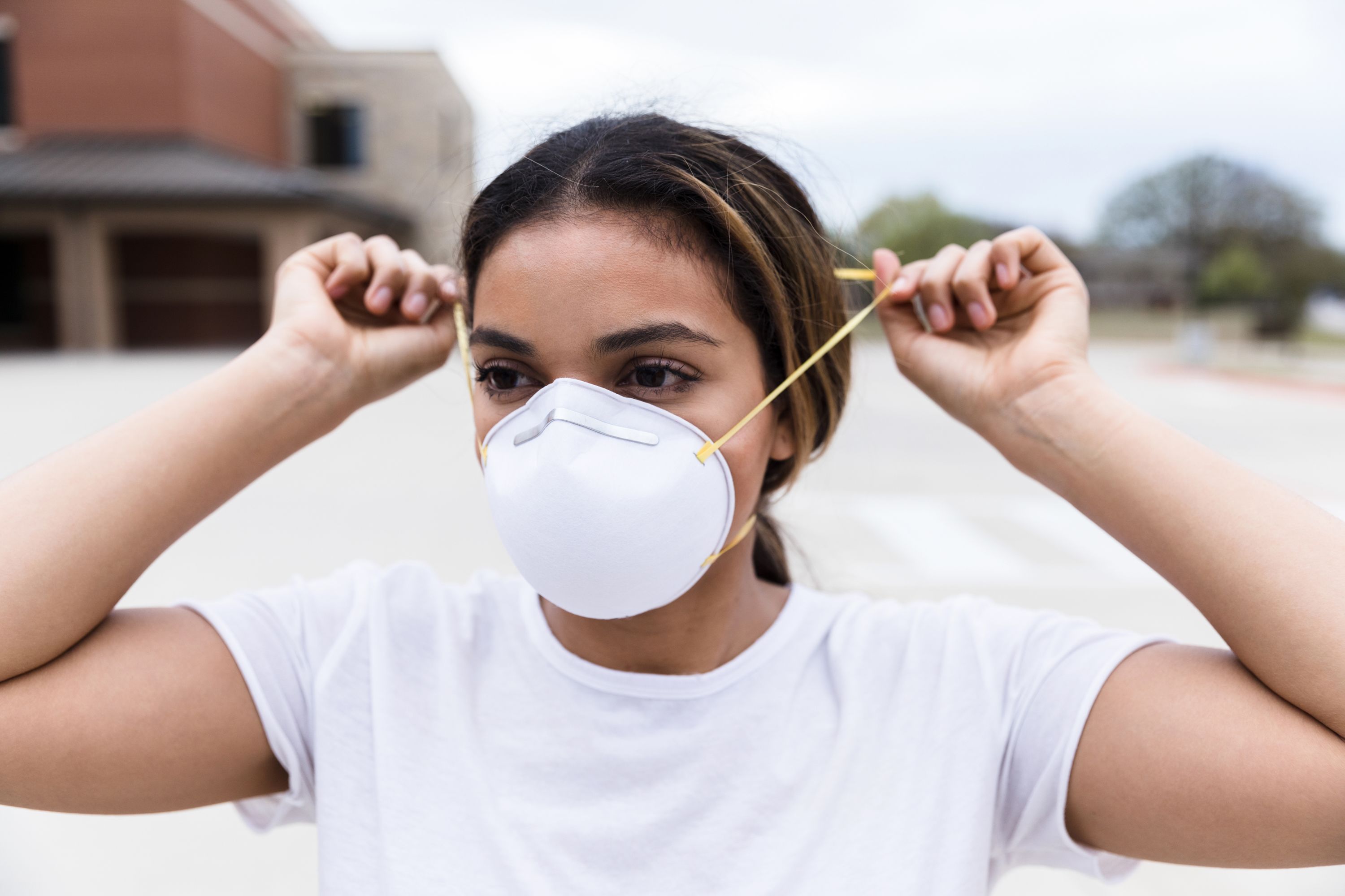 Shopper Wearing Face Mask Walks Past Editorial Stock Photo - Stock