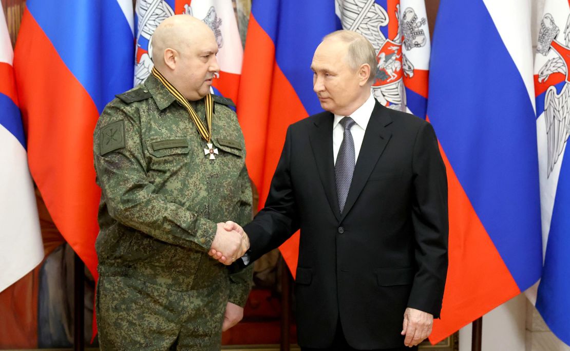 Gen. Sergey Surovikin is seen next to President Vladimir Putin on December 31, 2022.