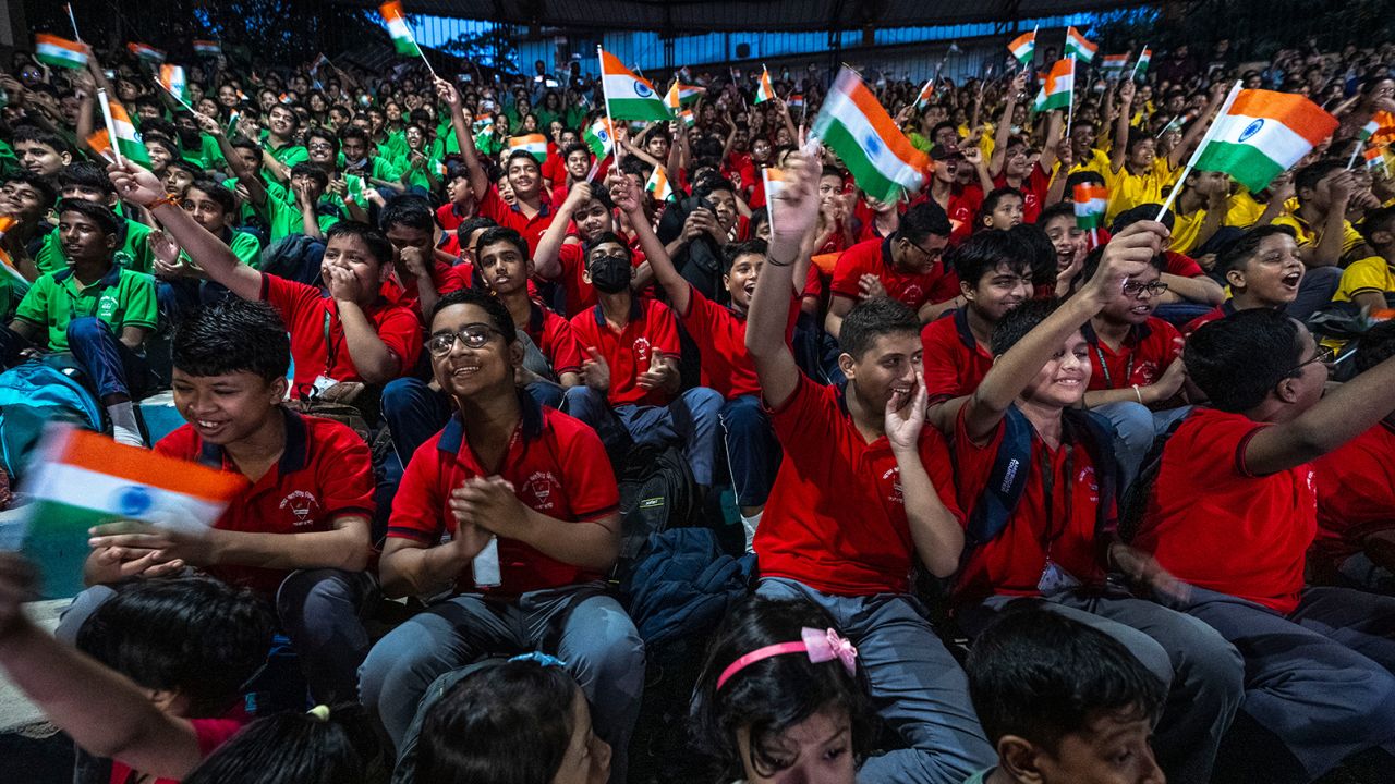 Schoolchildren celebrate the successful landing of spacecraft Chandrayaan-3 on the moon, in a school in Guwahati, India, Wednesday, Aug. 23, 2023. India has landed a spacecraft near the moon's south pole, an unchartered territory that scientists believe could hold vital reserves of frozen water and precious elements, as the country cements its growing prowess in space and technology. (AP Photo/Anupam Nath)