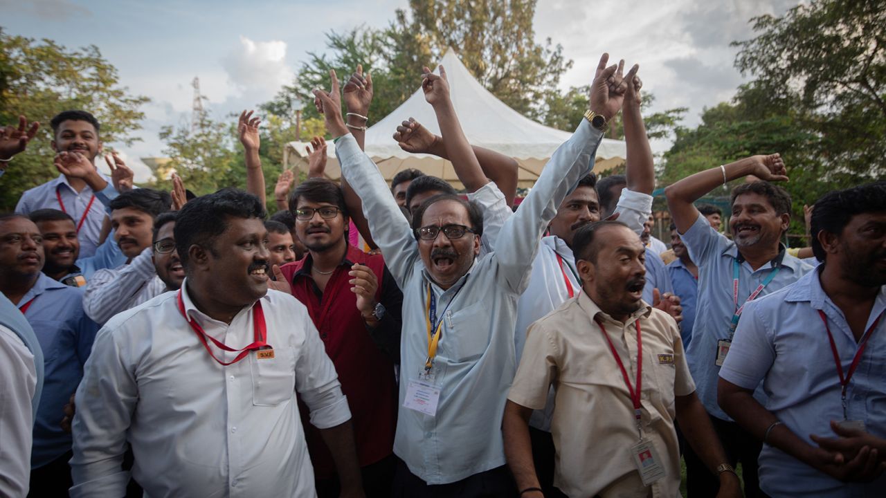Employees of the Indian Space Research Organisation (ISRO) celebrate after the successful landing of the Chandrayaan-3 mission. 