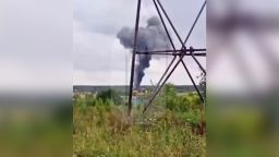 A view shows smoke rising above a plane on fire following an alleged air accident at a location given as Tver region, Russia, in this still image from video published August 23, 2023. Yevgeny Prigozhin, chief of Russian private mercenary group Wagner, was reportedly listed as a passenger on a private jet which crashed north of Moscow on August 23, 2023. Ostorozhno Novosti/Handout via REUTERS ATTENTION EDITORS - THIS IMAGE WAS PROVIDED BY A THIRD PARTY. NO RESALES. NO ARCHIVES. MANDATORY CREDIT. WATERMARK FROM SOURCE.