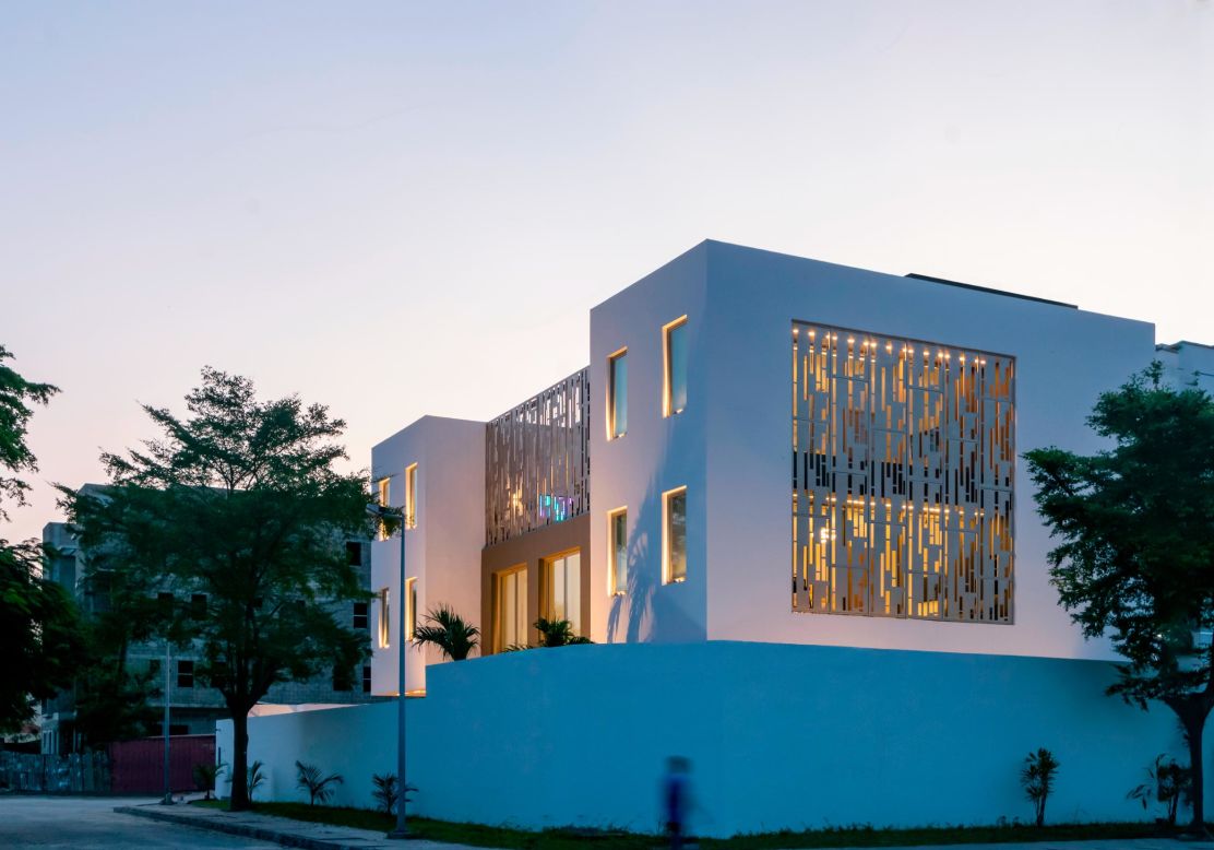 The home was named "The Lantern House" because of the glow from the internal lighting through the patterned steel screening, pictured here.