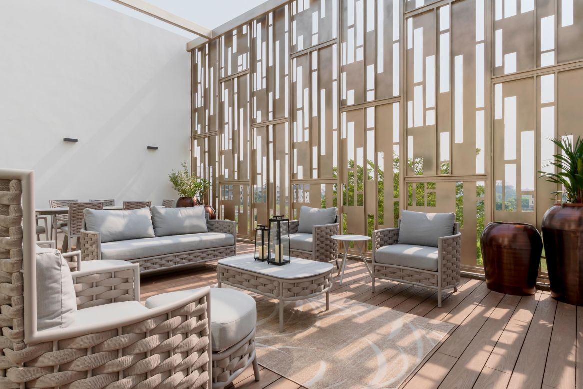The architect says the screening, seen here from the rooftop patio, creates the impression of both a solid and porous structure.