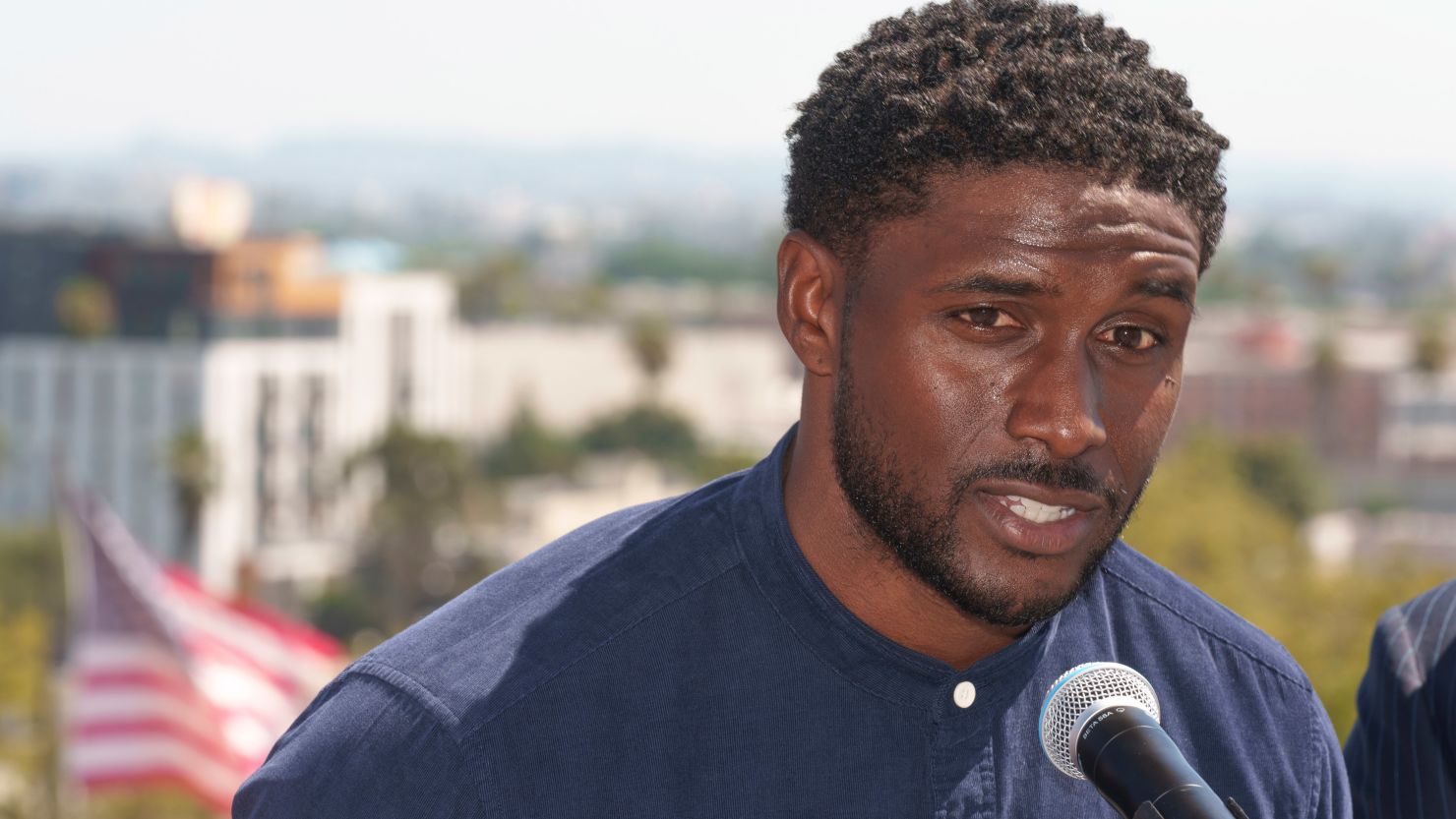 Former USC football player Reggie Bush speaks at a news conference announcing a defamation lawsuit against the NCAA at the Los Angeles Memorial Coliseum.