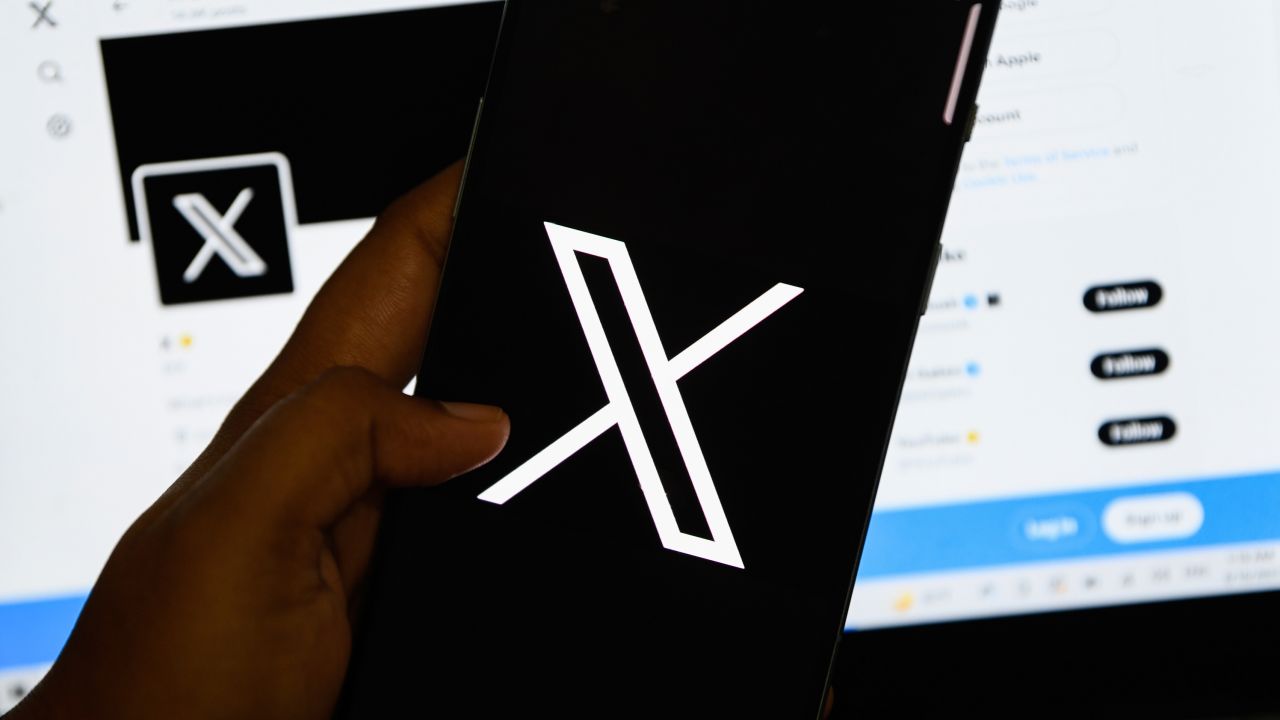 In this photo Illustration, the new (Twitter) logo rebranded as X seen displayed on a smartphone.