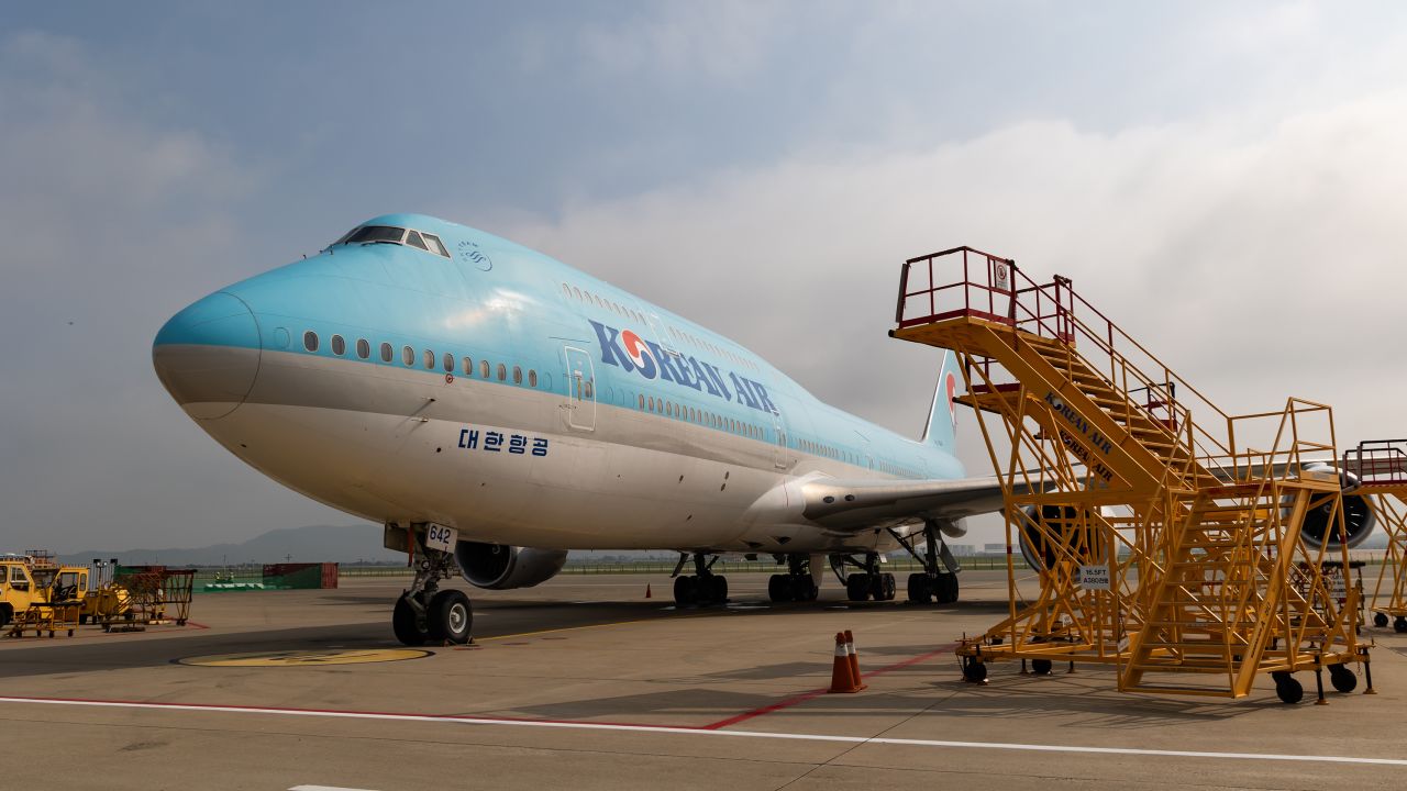A Boeing Co. 747-8I passenger aircraft, operated by Korean Air Lines Co., on the tarmac outside the company's hangar at Incheon International Airport in Incheon, South Korea, on Wednesday, July 19, 2023. Korean Air asked European Union regulators to delay their in-depth review of its plan to buy smaller South Korean rival Asiana Airlines Inc. for 1.8 trillion won ($1.4 billion) while it fine tunes a package of remedies to allay antitrust concerns. Photographer: SeongJoon Cho/Bloomberg via Getty ImagesPhotographer: SeongJoon Cho/Bloomberg via Getty Images