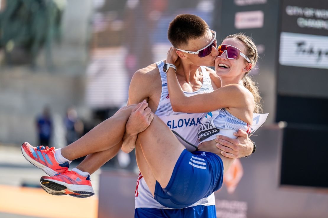 Dominik Cerny of Slovakia proposes to Hana Burzalova of Slovakia after competing in menâ€™s and womenâ€™s 35 km race walk during day 6 of the 2023 World Athletics Championships on August 24, 2023 in Budapest.