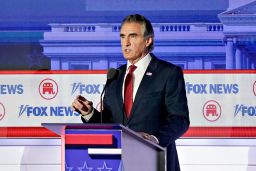Doug Burgum, governor of North Dakota and 2024 Republican presidential candidate, during the Republican primary presidential debate hosted by Fox News in Milwaukee, Wisconsin, US, on Wednesday, Aug. 23, 2023. Republican presidential contenders are facing off in their first debate of the primary season, minus frontrunner Donald Trump, who continues to lead his GOP rivals by a double-digit margin.