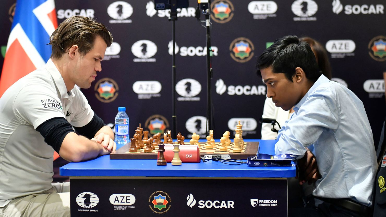 India's Rameshbabu Praggnanandhaa (R) competes against Norway's Magnus Carlsen (L) during the final at the FIDE Chess World Cup in Baku on August 24, 2023. (Photo by Tofik BABAYEV / AFP) (Photo by TOFIK BABAYEV/AFP via Getty Images)