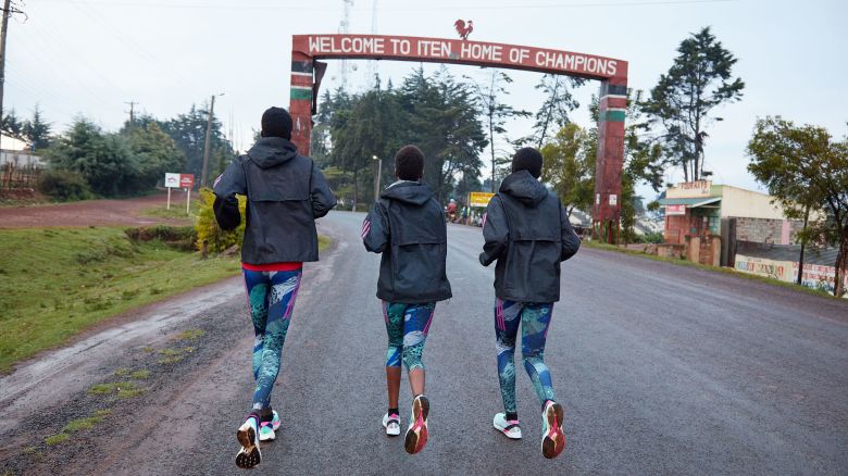 Agnes' Tirop's sisters, Eve Tirop, 21, (from left) Damaris Tirop, 19, and Agnes' best friend, Monica Maiyo, 23, go for their dawn training run on June 24  in Iten, Kenya.