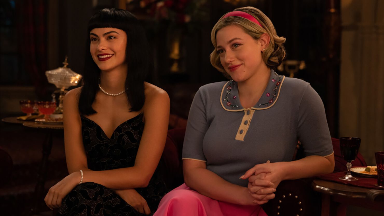 Camila Mendes as Veronica Lodge and Lili Reinhart as Betty Cooper. 