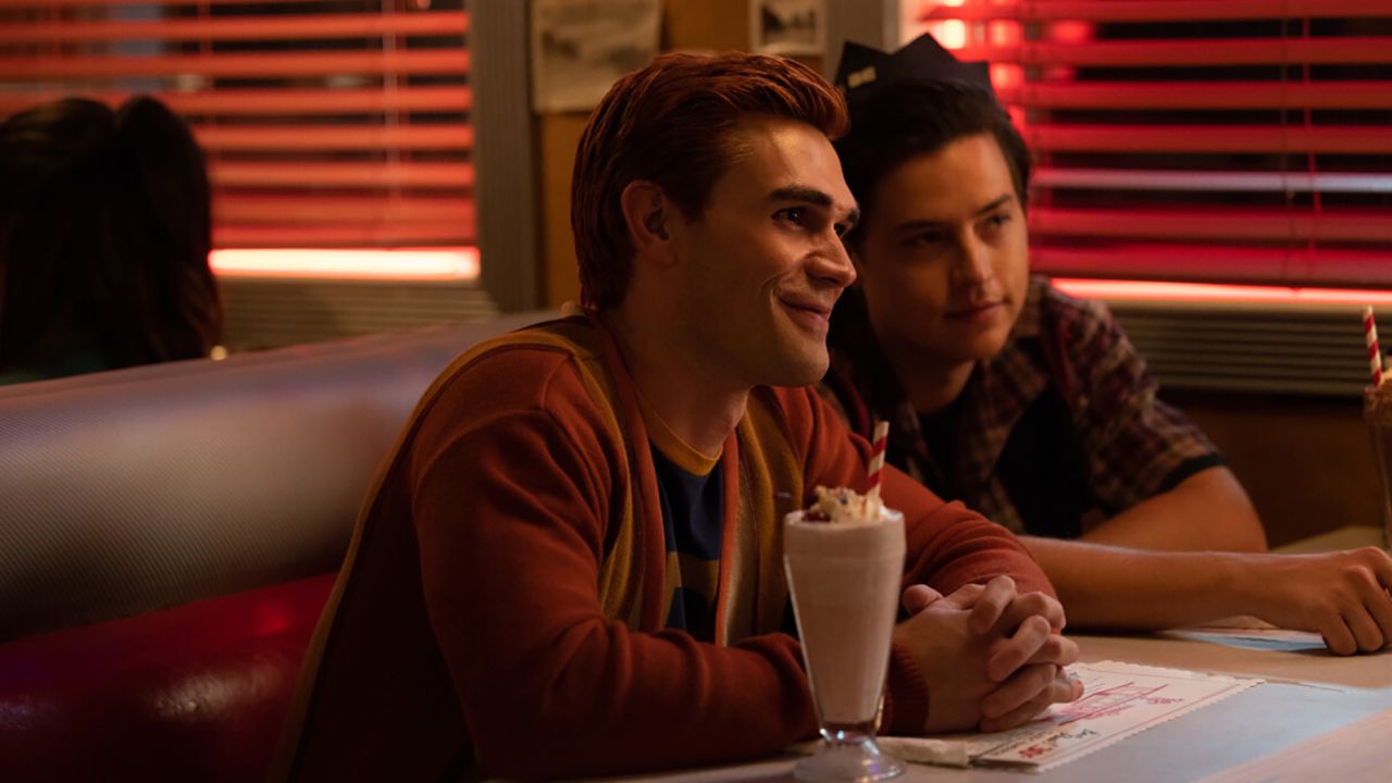 KJ Apa as Archie Andrews and Cole Sprouse as Jughead Jones
