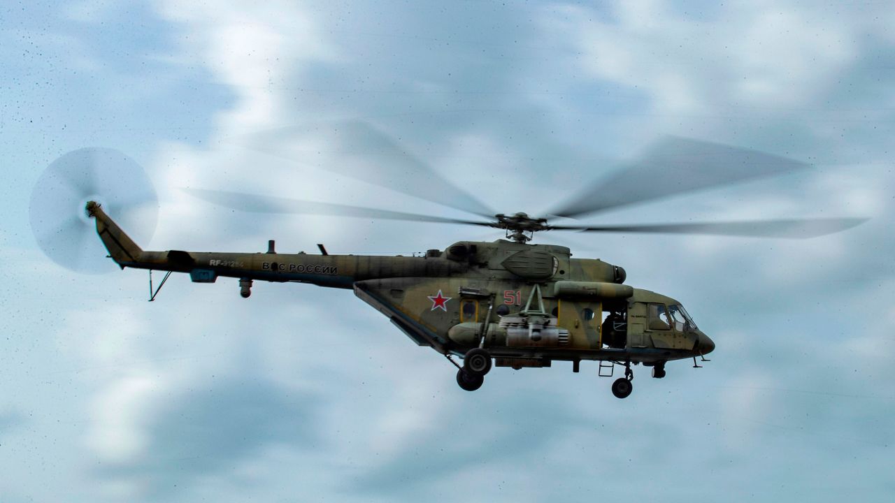 A Russian Mil Mi-8 military helicopter patrols oil fields in Syria's northeastern Hasakeh province on February 4, 2021.
